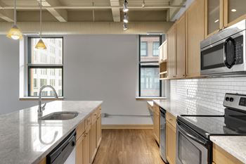 Oversized windows in select homes at lowertown lofts, minnesota
